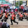Polres Kutim ini saat melakukan atraksi di tengah jalan saat ikut lomba gerak jalan, Kamis (20/10). [humas pemkab Kutim]