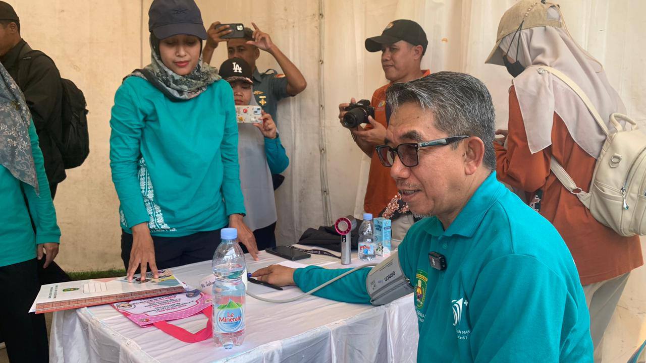 HKN ke-61 Kutim Menggema dengan Senam dan Gerakan Minum Susu Massal